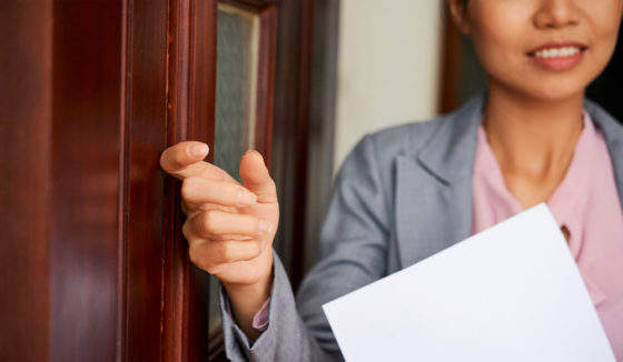Agent knocking on door